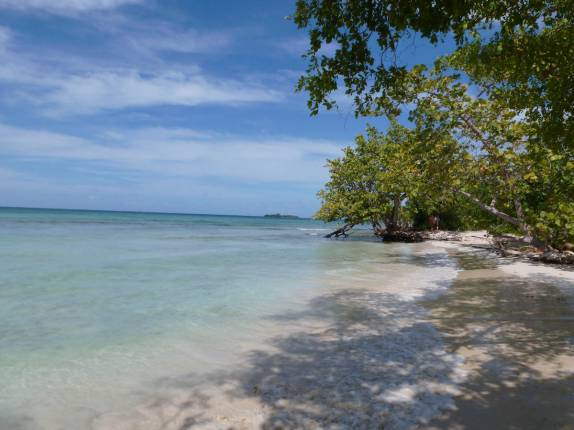 A maravilhosa praia de Long Bay, em Negril, na Jamaica A maravilhosa praia de Long Bay, em Negril, na Jamaica