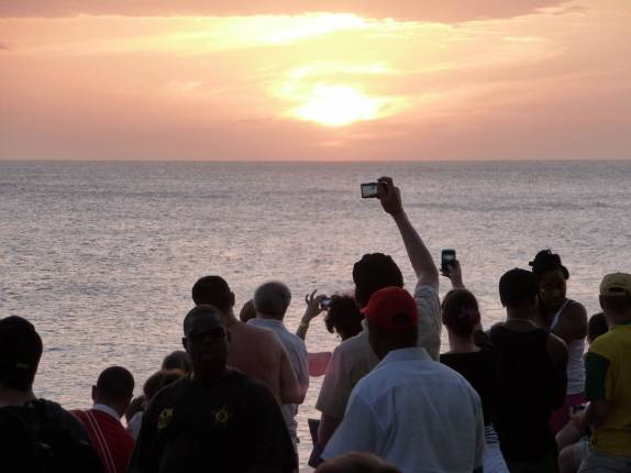 Fim de tarde disputado e fotografado no Rick's Cafe, em West End, em Negril, na Jamaica Fim de tarde disputado e fotografado no Rick's Cafe, em West End, em Negril, na Jamaica