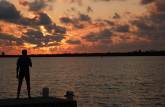 Admirando o espetáculo diário do pôr-do-sol em Little Cayman, nas Ilhas Caiman