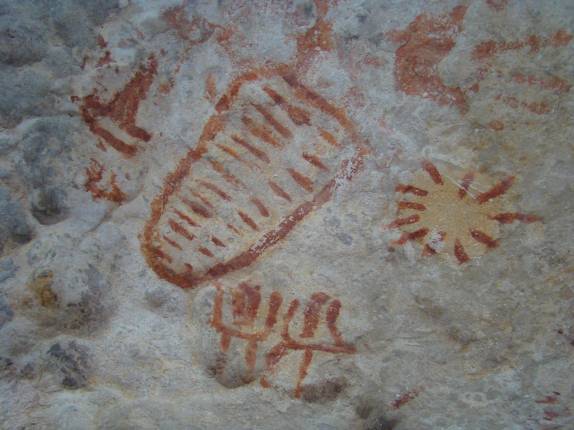 Espiga de milho, pé de milho e o sol retratados nas pinturas rupestres do Lajedo da Soledade, região de Apodi - RN Espiga de milho, pé de milho e o sol retratados nas pinturas rupestres do Lajedo da Soledade, região de Apodi - RN